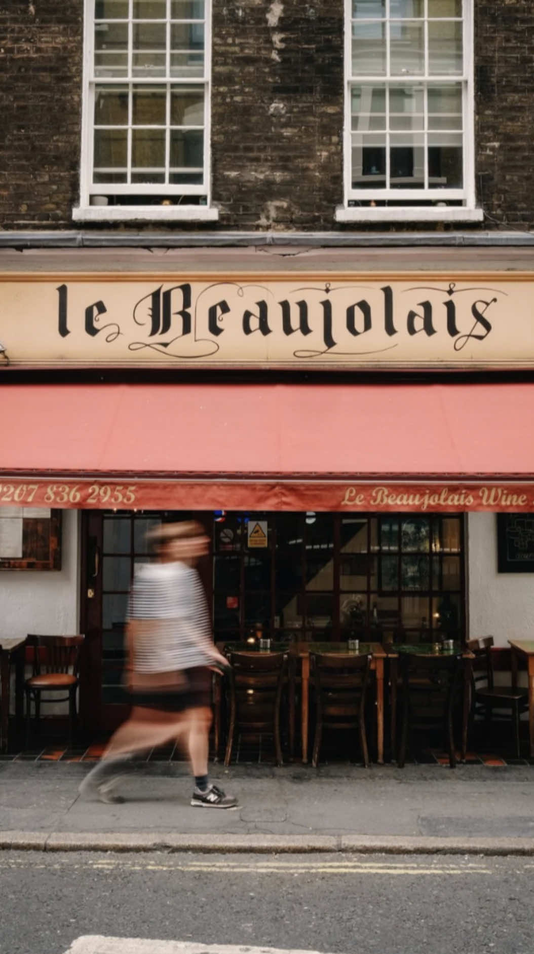 Proper French wine and retro charm — video still by Rosie Dart